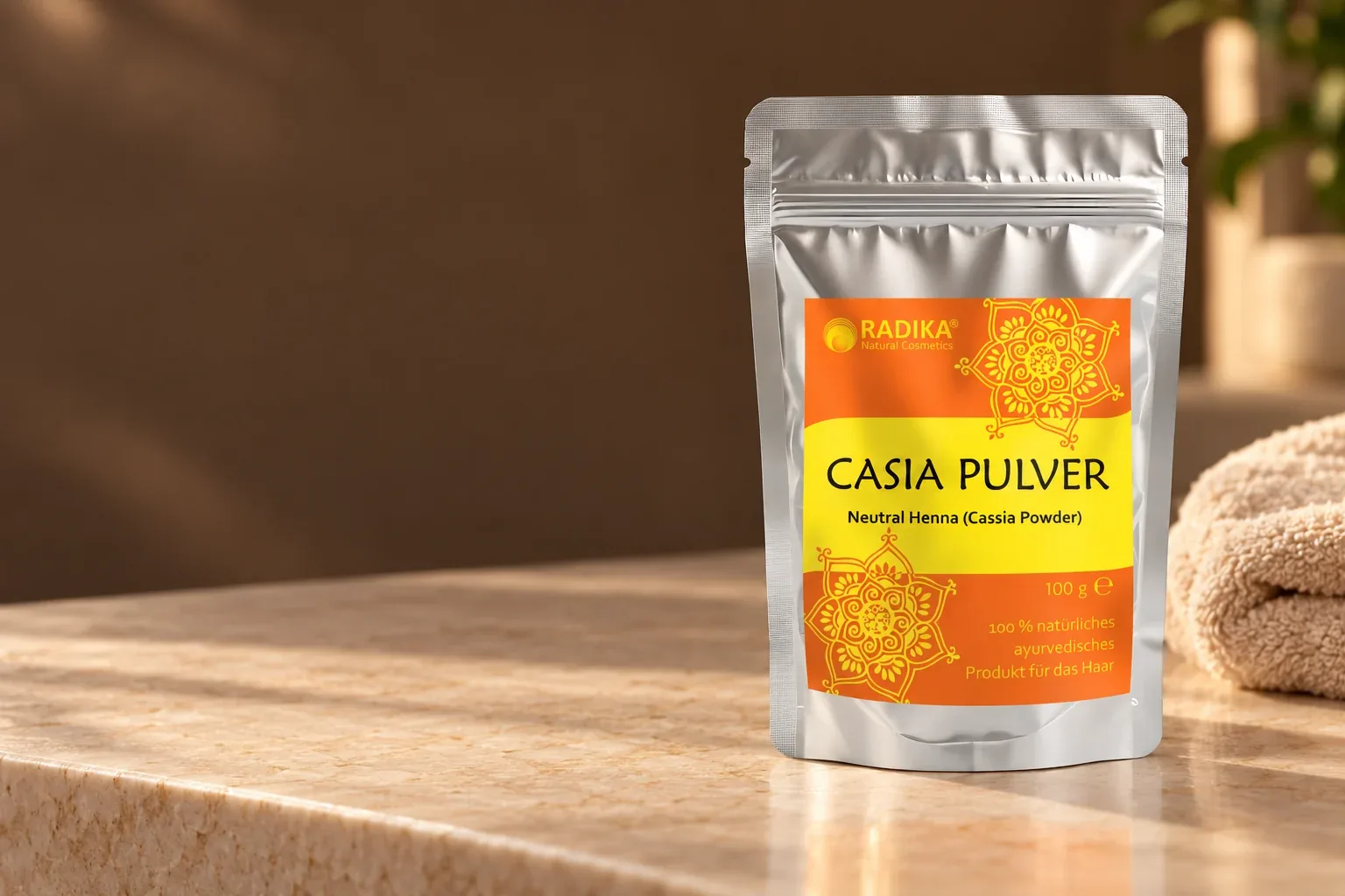 Pôvodné strieborné vrecko Radika Cassia 100 g s oranžovožltou etiketou