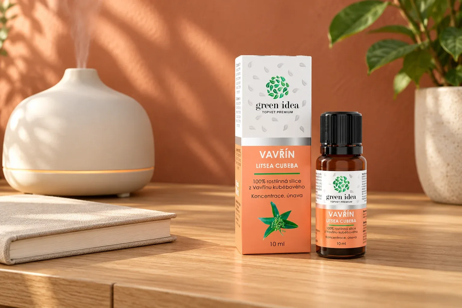 Silica Vavrín Green idea v domácom aromatickom kútiku pri elektrickom difuzéri a knihe
